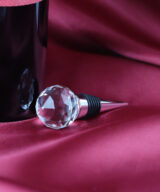 John Lewis Gem Bottle Stopper and bottle of red wine