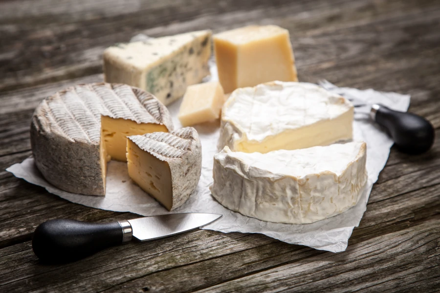 Cheese board with Brie and Camembert cheeses