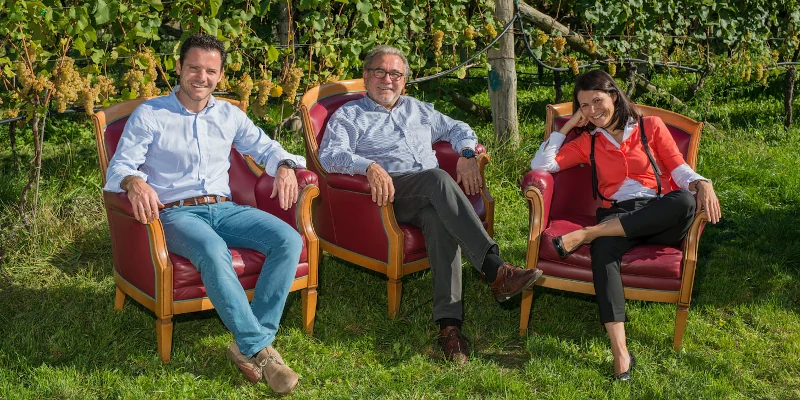 K.Martini and Sohn owners, Gabriel Lukas Martini and Maren Martini in a vineyard in Alto Adige