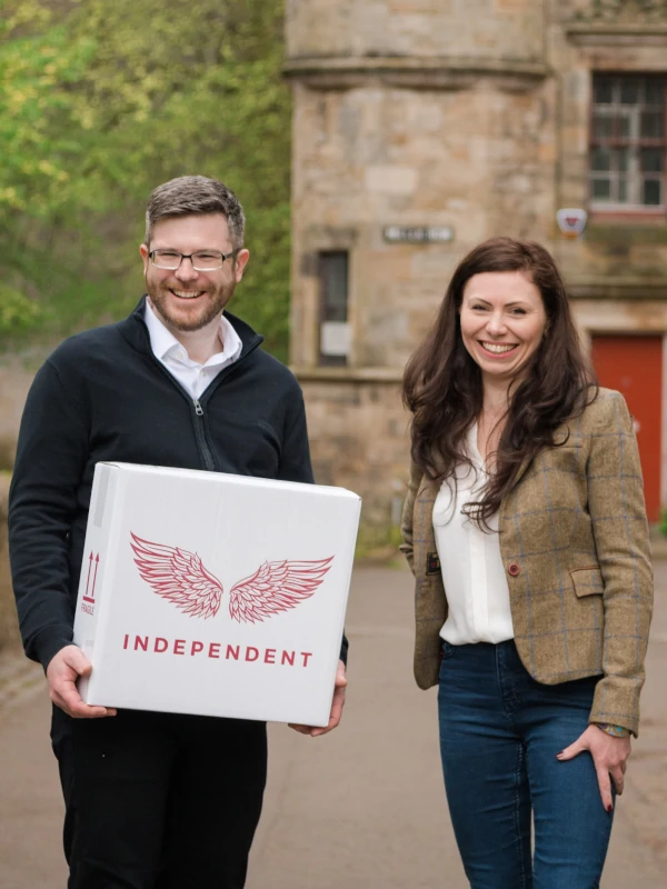 Elvira and Oleg - founders of Independent wine in front their warehouse in Edinburgh