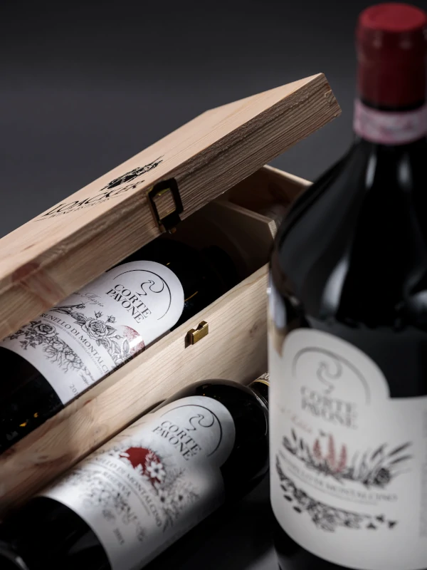Bottles of Corte Pavone Brunello di Montalcino wines in boxes